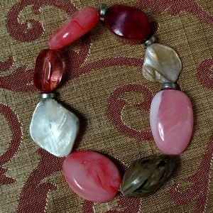 Stretch bracelet in pinks, purple, and shell